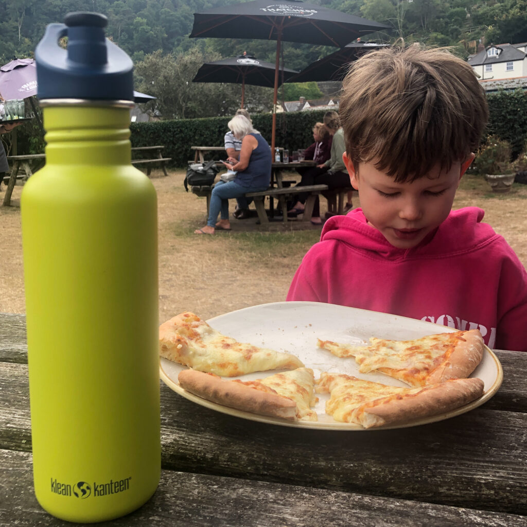 Teaching sustainable living by using a metal water bottle instead of single use plastic bottles