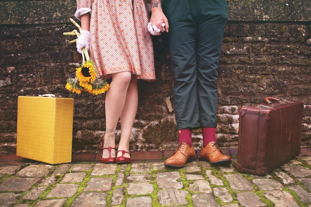 Romantic Comedy books: photo of the legs of a couple dressed in 1950's clothing